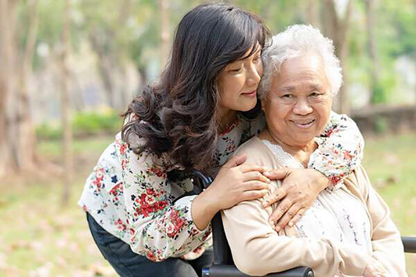 daughter hugging mother